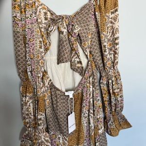 NWT from boutique. Size small. Open back dress.